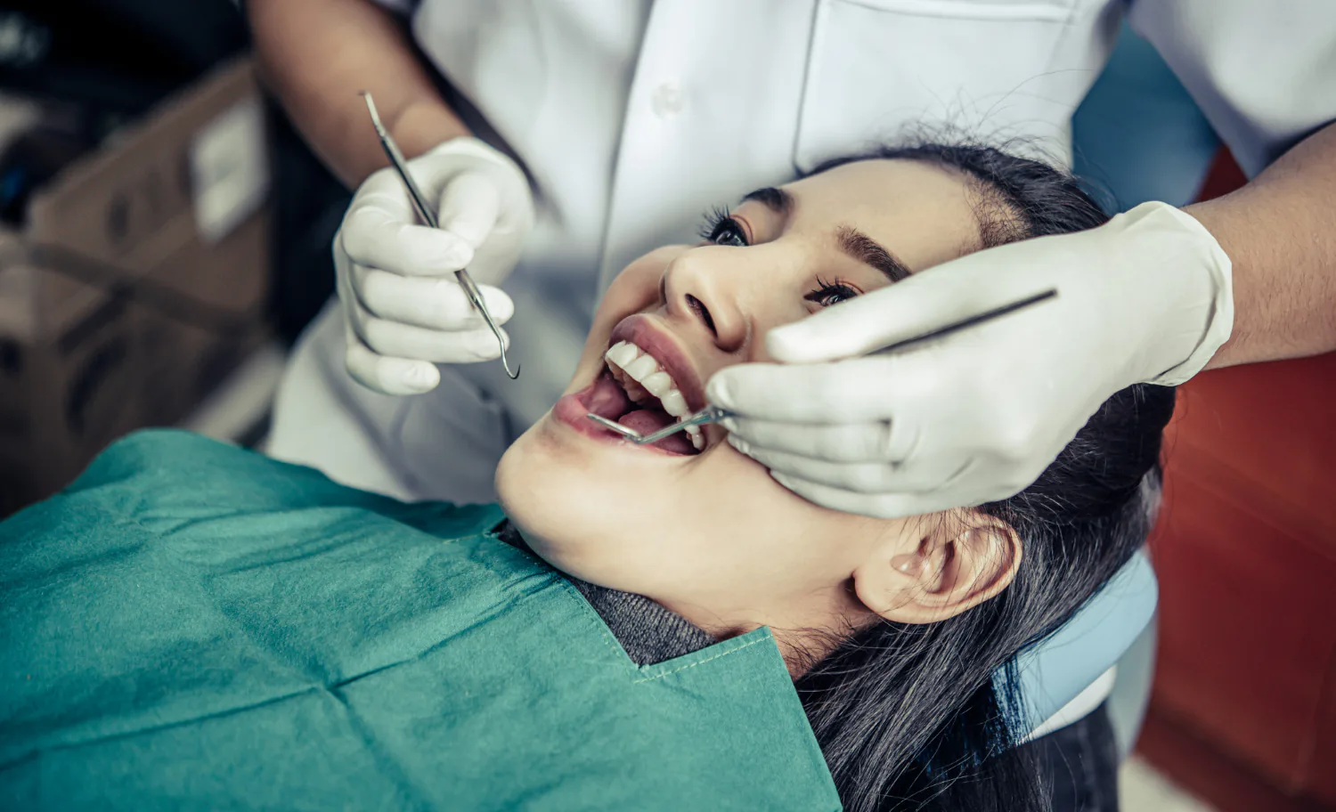 Dentist checking if your dental crown is fitted properly.