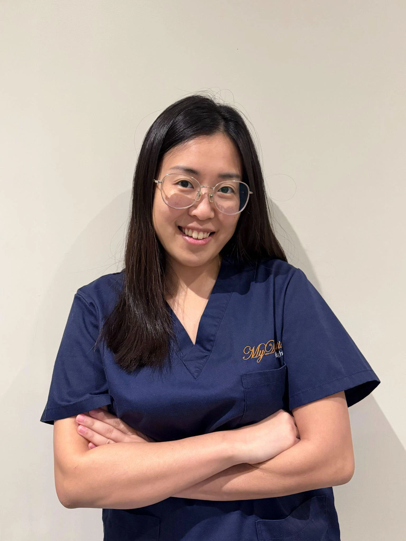 A photo of Dr Shin Ying Chia, who specialises in restorative and aesthetic dentistry.