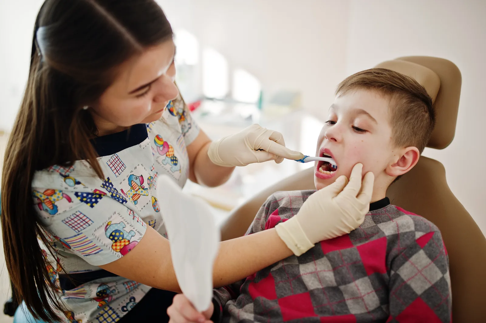 Little boy at dentist chair. Children dental.