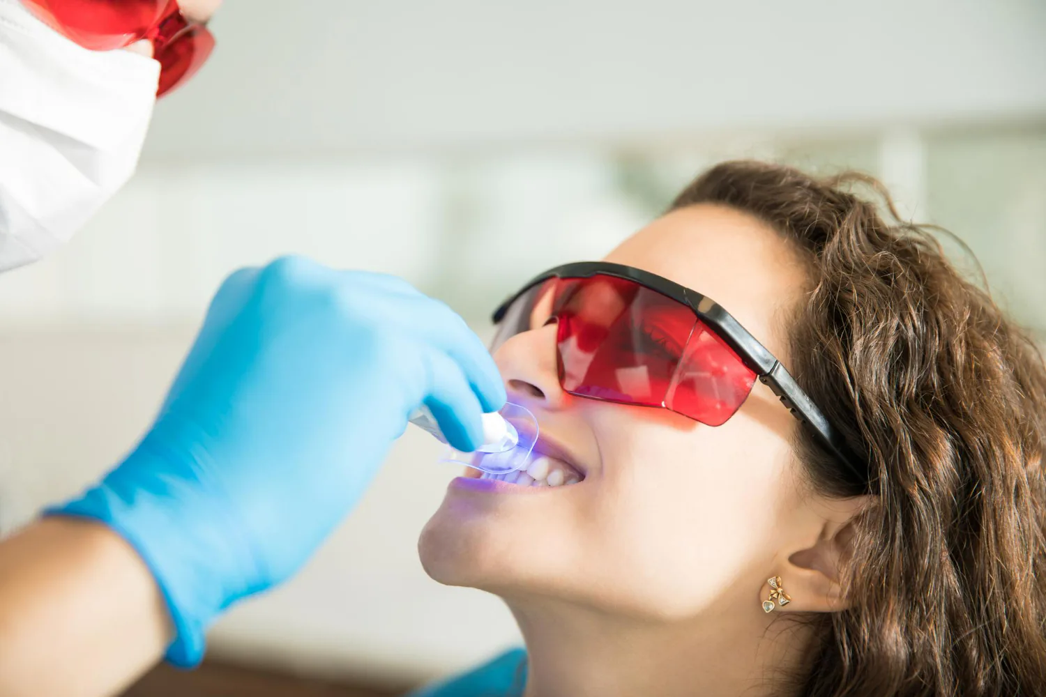 Patient receiving a teeth whitening treatment.